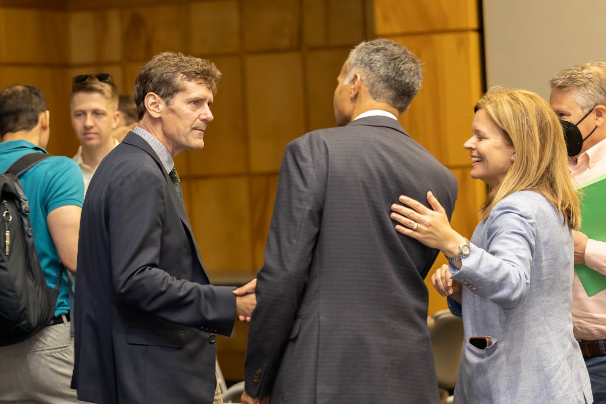 People standing around talking at the 2023 Honors and Awards Ceremony